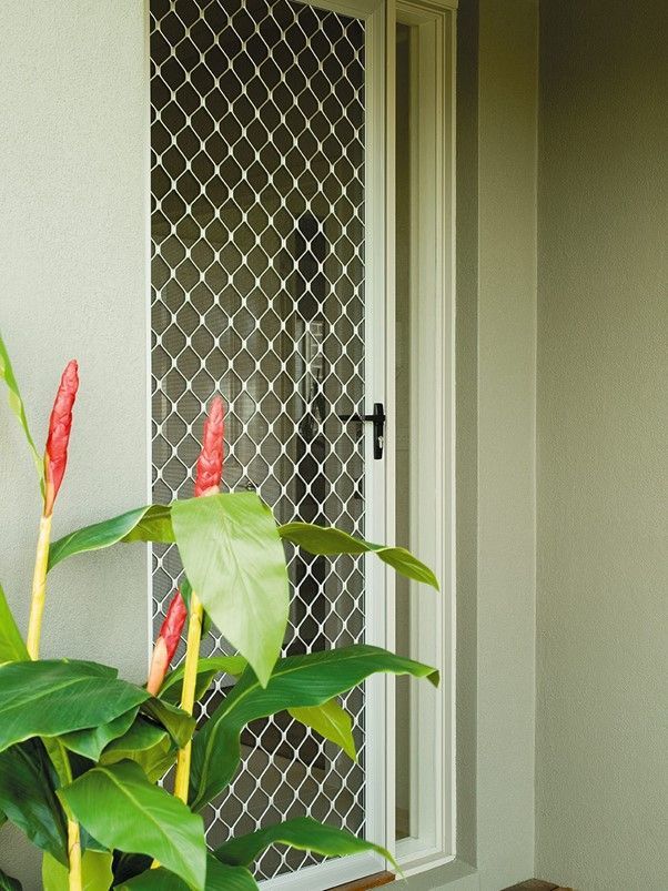 Stylish Diamond Grille Window Screen for Security and Style A window screen featuring a stylish diamond-pattern grille for added security and aesthetic appeal.